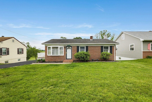 390 Frontier Dr, Staunton, VA 24401 - view of front of house featuring brick siding, a chimney, and a front lawn