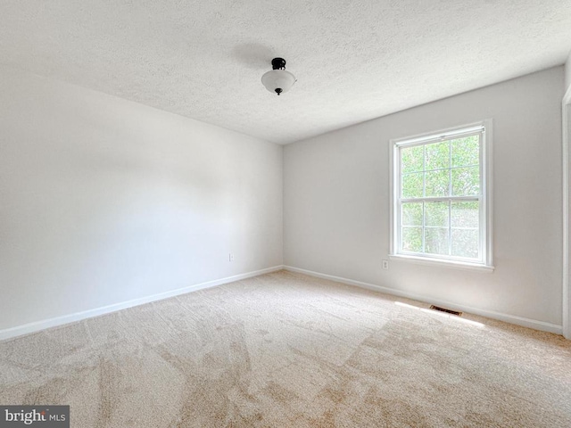 4110 Englandtown Rd, Fredericksburg, VA 22408 - carpeted spare room with baseboards and a textured ceiling