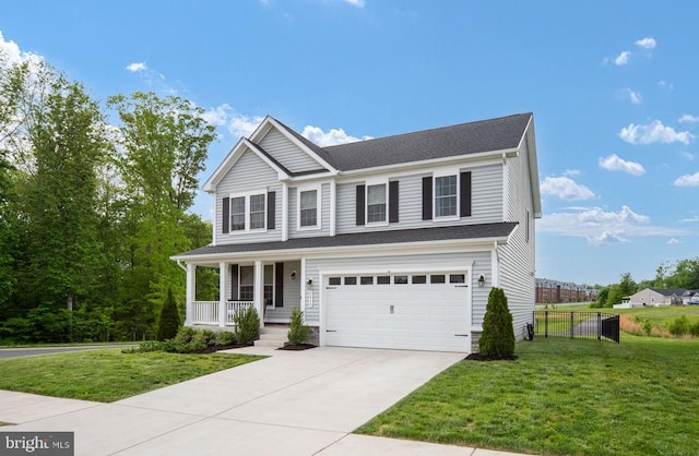 traditional-style house with a porch, a garage, and concrete driveway