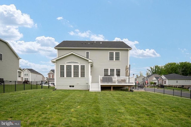 rear view of house with a residential view and a deck