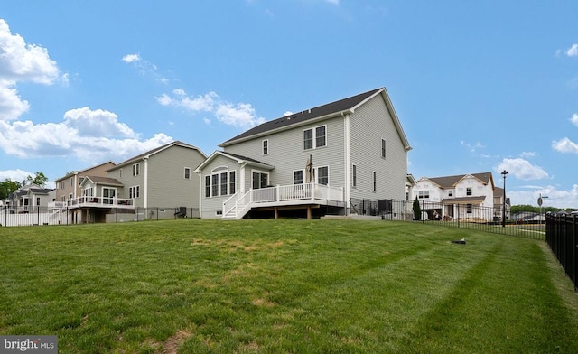back of house with a residential view, stairs, and a deck