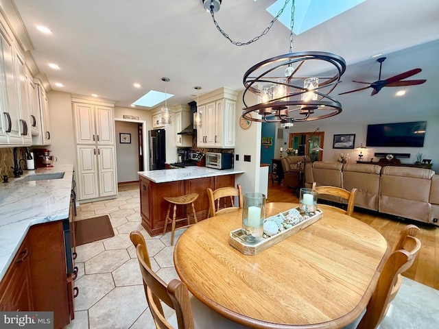 778 Overton Dr, Mineral, VA 23117 - dining space with recessed lighting, a chandelier, ceiling fan, and a skylight