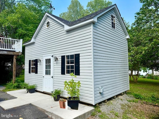 778 Overton Dr, Mineral, VA 23117 - view of home's exterior with a deck, a patio, and a shingled roof