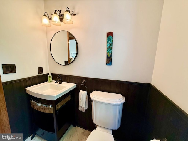 778 Overton Dr, Mineral, VA 23117 - half bath featuring a wainscoted wall, toilet, and vanity