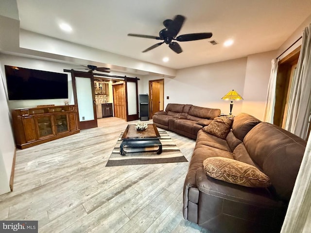 778 Overton Dr, Mineral, VA 23117 - living room with a barn door, a ceiling fan, light wood finished floors, and recessed lighting