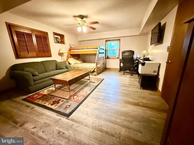 778 Overton Dr, Mineral, VA 23117 - bedroom featuring an office area, hardwood / wood-style floors, baseboards, and a ceiling fan