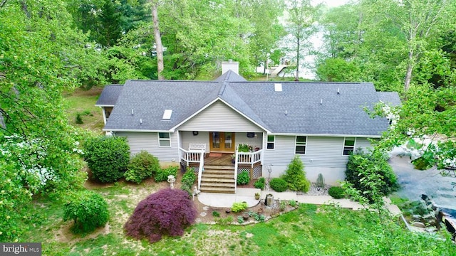 778 Overton Dr, Mineral, VA 23117 - view of front facade with stairs, a shingled roof, french doors, and a wooden deck