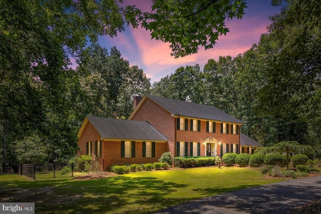 100 River Bend Rd W, Fredericksburg, VA 22407 - colonial house with brick siding and a chimney