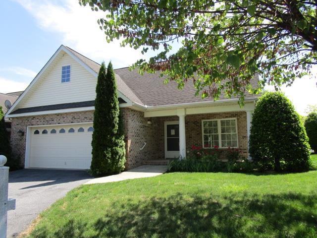 384 Hickory Grove Cir, Harrisonburg, VA 22801 - view of front of house featuring brick siding, asphalt driveway, a front lawn, a garage, and roof with shingles