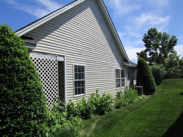 384 Hickory Grove Cir, Harrisonburg, VA 22801 - view of property exterior featuring a yard and central AC