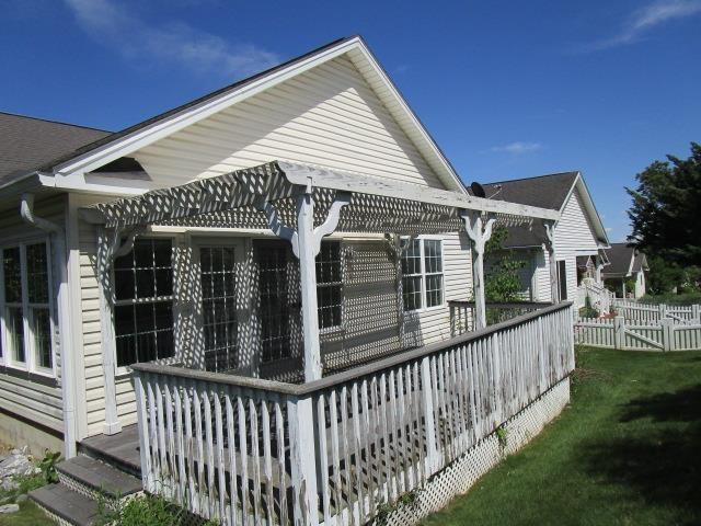 384 Hickory Grove Cir, Harrisonburg, VA 22801 - view of side of property featuring a wooden deck and a pergola