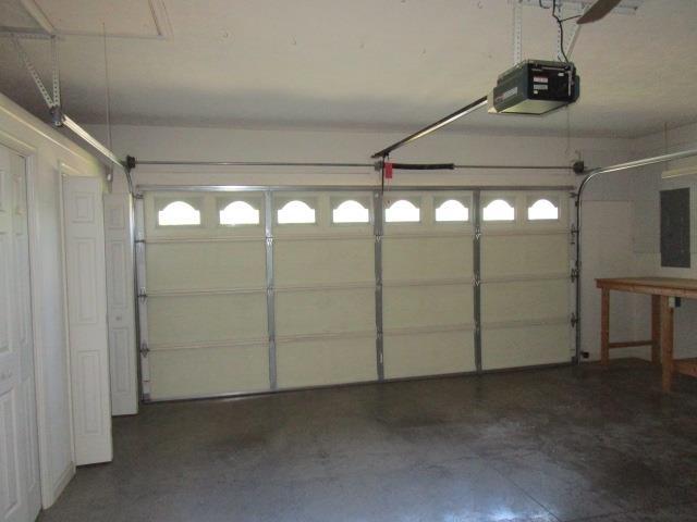 384 Hickory Grove Cir, Harrisonburg, VA 22801 - garage featuring a garage door opener