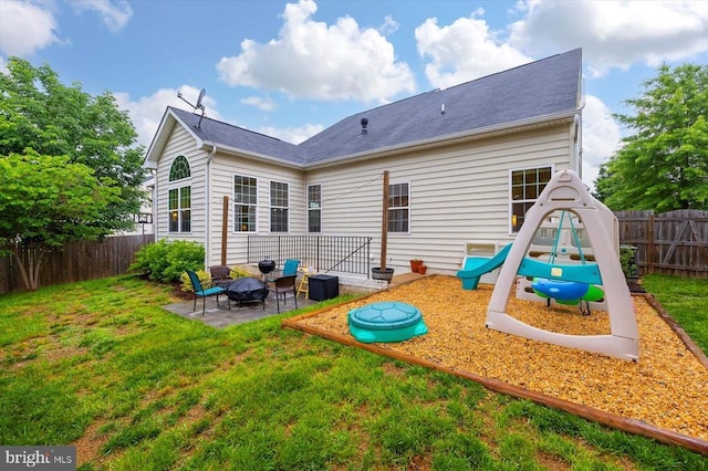 12122 Majestic Pl, Culpeper, VA 22701 - back of property with a playground, a patio, and an outdoor fire pit