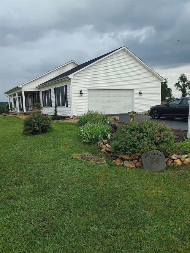 112 Guernsey Ln, Staunton, VA 24401 - view of property exterior with an attached garage and a yard