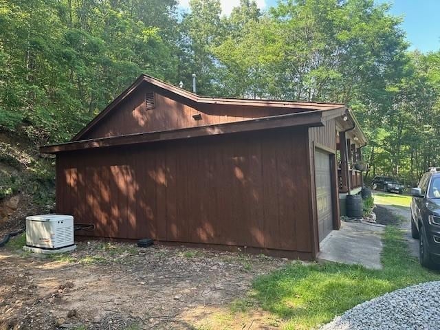 1063 High Valley Dr, Monterey, VA 24465 - view of side of property featuring a central AC unit and a garage
