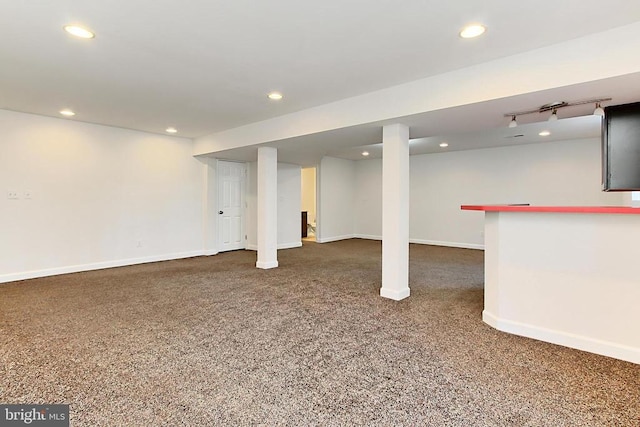 finished below grade area with baseboards and recessed lighting