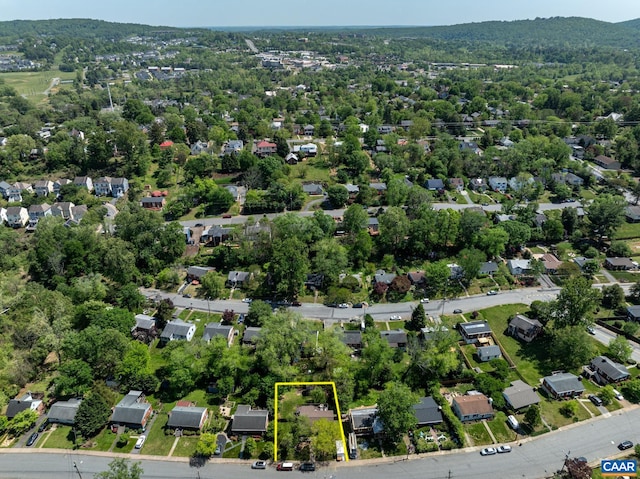 aerial perspective of suburban area featuring property boundaries highlighted