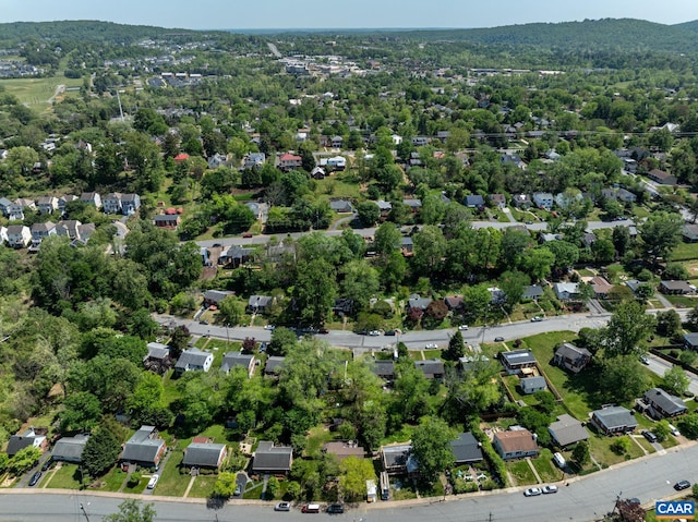 aerial overview of property's location with nearby suburban area