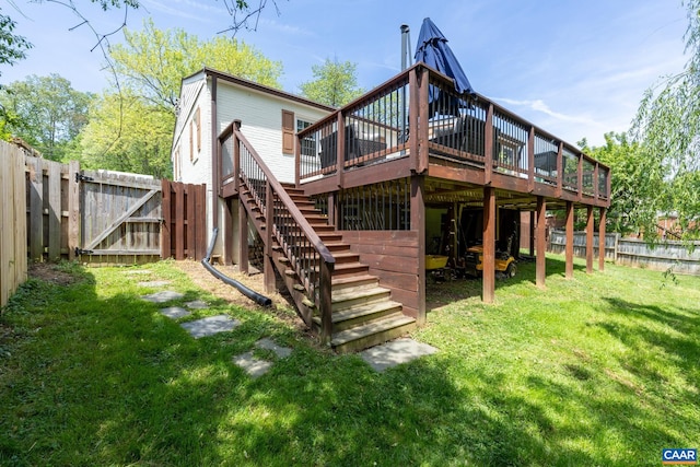 back of house with a wooden deck, stairway, and a gate