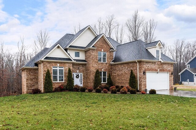 114 Jaspers Ln, Stuarts Draft, VA 24477 - traditional home featuring brick siding, a garage, a front lawn, driveway, and a shingled roof