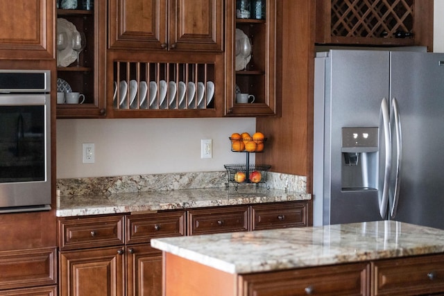 114 Jaspers Ln, Stuarts Draft, VA 24477 - kitchen featuring appliances with stainless steel finishes, light stone counters, and glass insert cabinets