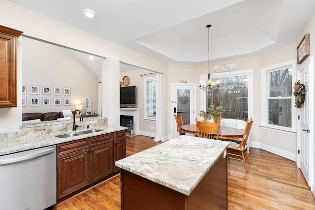 114 Jaspers Ln, Stuarts Draft, VA 24477 - kitchen featuring dishwasher, a sink, light wood-type flooring, light stone countertops, and a fireplace