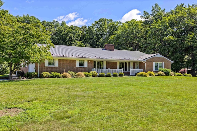 192 Sandy Ridge Rd, Waynesboro, VA 22801 - single story home featuring covered porch, a chimney, a front yard, and brick siding
