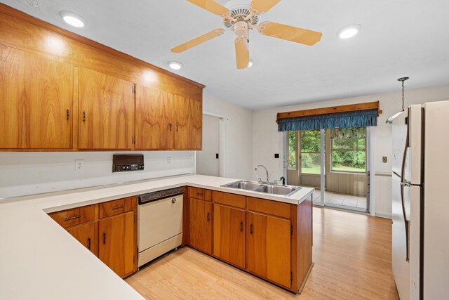 192 Sandy Ridge Rd, Waynesboro, VA 22801 - kitchen featuring white appliances, light wood finished floors, a peninsula, light countertops, and recessed lighting