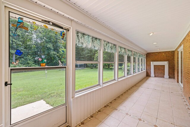 192 Sandy Ridge Rd, Waynesboro, VA 22801 - unfurnished sunroom with brick wall and tile patterned flooring
