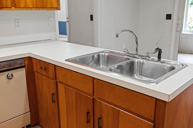 192 Sandy Ridge Rd, Waynesboro, VA 22801 - kitchen featuring dishwasher, light countertops, and brown cabinetry