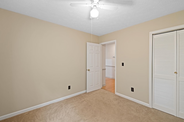 192 Sandy Ridge Rd, Waynesboro, VA 22801 - unfurnished bedroom featuring light colored carpet, a closet, and a ceiling fan