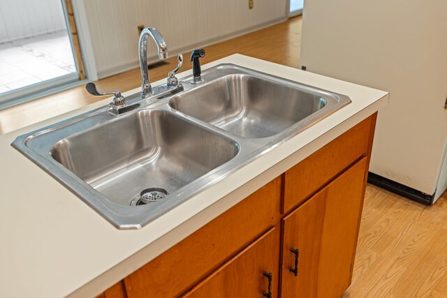 192 Sandy Ridge Rd, Waynesboro, VA 22801 - kitchen view of light countertops, brown cabinetry, and light wood-style floors