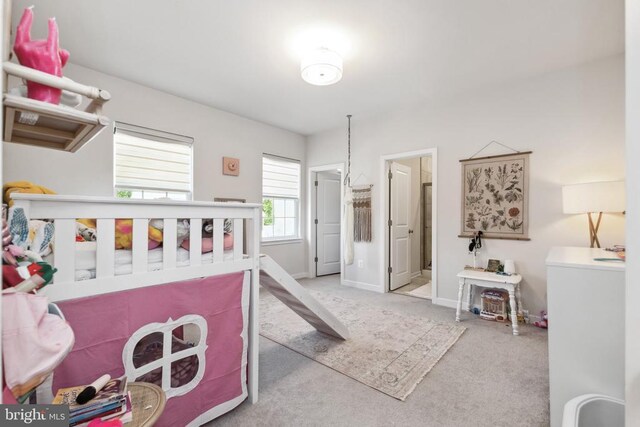 2089 Whithorn Hl, Jeffersonton, VA 22724 - carpeted bedroom featuring baseboards and washer / dryer