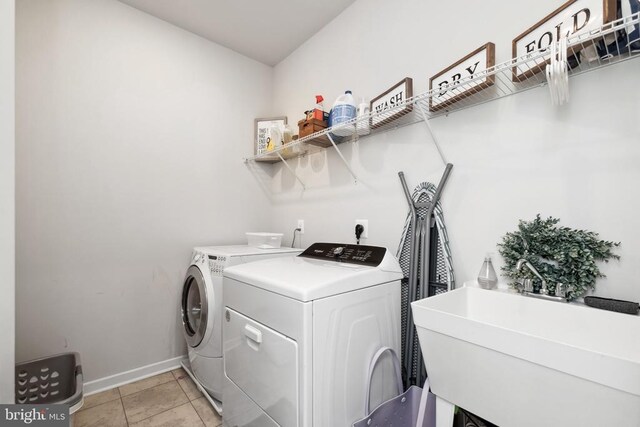 2089 Whithorn Hl, Jeffersonton, VA 22724 - washroom with washing machine and clothes dryer and baseboards