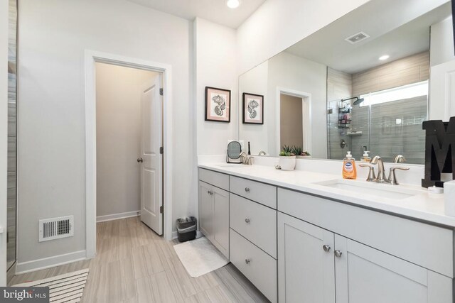 2089 Whithorn Hl, Jeffersonton, VA 22724 - full bathroom with vanity, a shower stall, baseboards, and recessed lighting