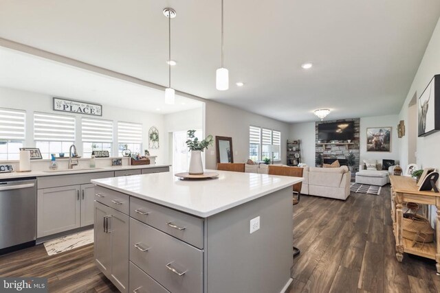 2089 Whithorn Hl, Jeffersonton, VA 22724 - kitchen featuring gray cabinetry, a sink, dishwasher, a center island, and light countertops