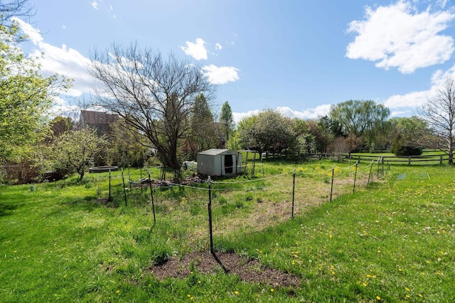 49 Bridgeport Dr, Waynesboro, VA 22980 - view of yard featuring a storage shed, an outdoor structure, and a rural view