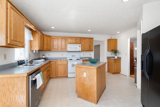 49 Bridgeport Dr, Waynesboro, VA 22980 - kitchen with white appliances, light flooring, a sink, a kitchen island, and recessed lighting