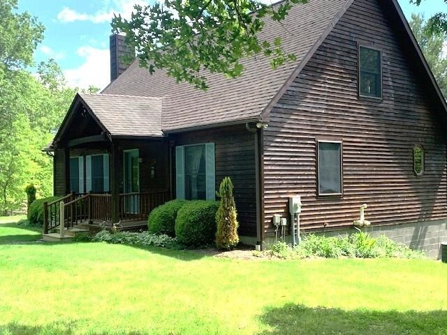625 Hummingbird Ln, Monterey, VA 24465 - rear view of property featuring a yard, a chimney, and roof with shingles