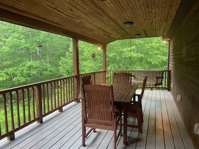625 Hummingbird Ln, Monterey, VA 24465 - wooden deck with outdoor dining space