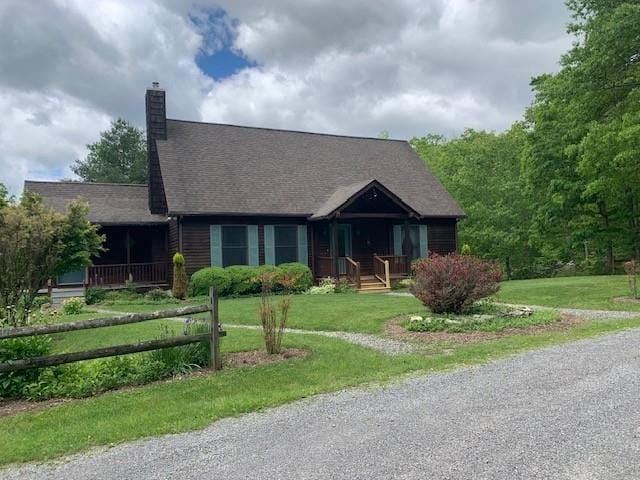 625 Hummingbird Ln, Monterey, VA 24465 - view of front of home featuring a front lawn, a chimney, and a shingled roof