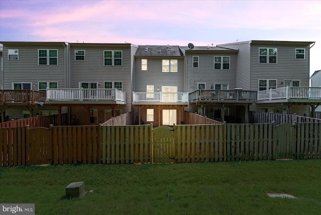 4631 Alliance Way, Fredericksburg, VA 22408 - back of house at dusk with a gate and a fenced backyard