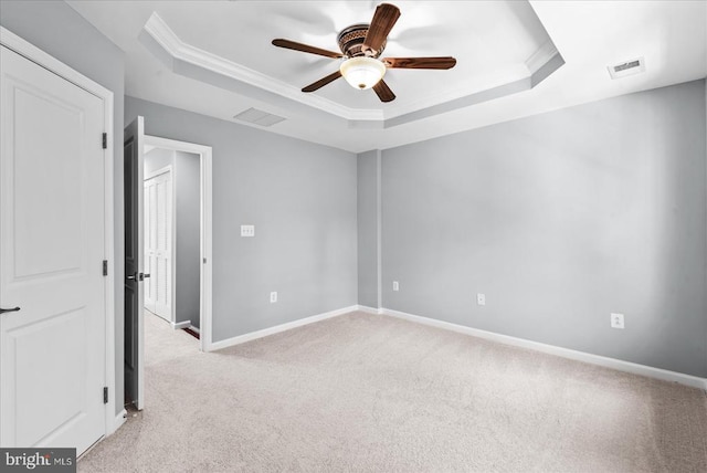 4631 Alliance Way, Fredericksburg, VA 22408 - unfurnished room with a tray ceiling, light carpet, a ceiling fan, and crown molding