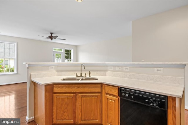 5307 Philippi Pl W, Fredericksburg, VA 22407 - kitchen with black dishwasher, wood finished floors, a ceiling fan, and light countertops
