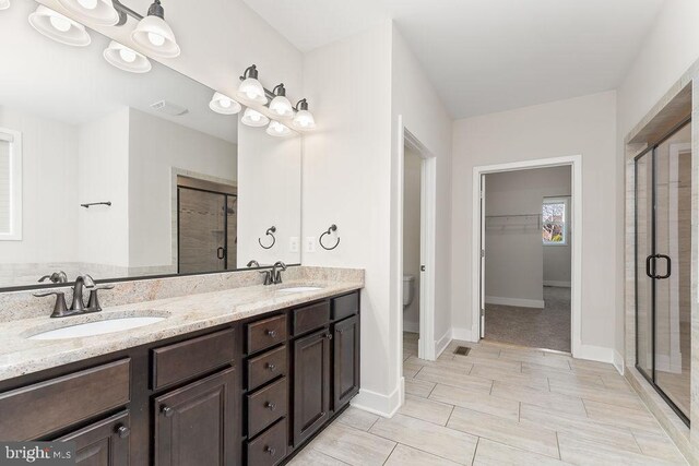 unfurnished bedroom featuring carpet, baseboards, a closet, and a textured ceiling