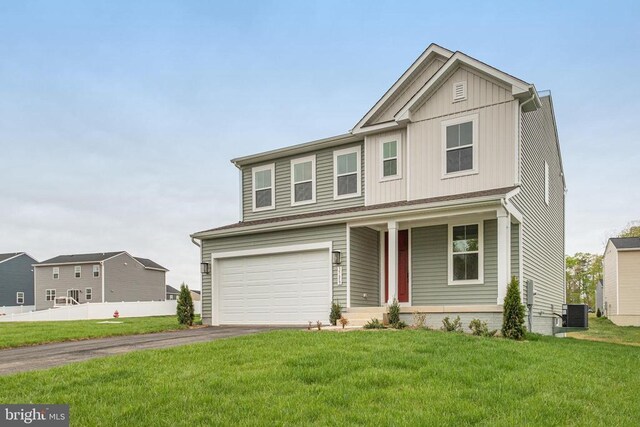 view of front of house featuring driveway, board and batten siding, covered porch, an attached garage, and cooling unit