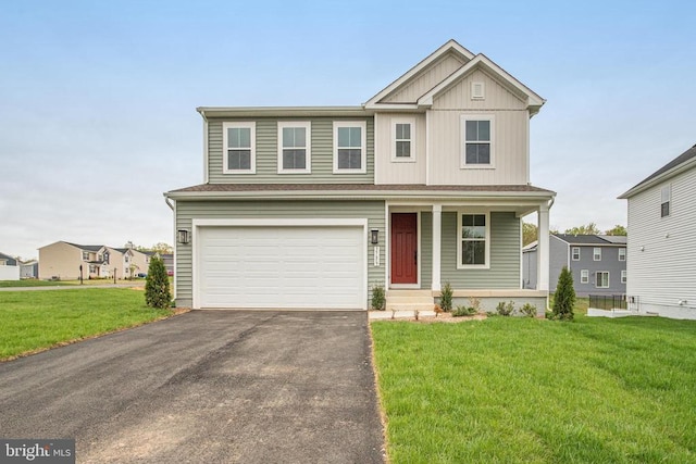 view of front facade featuring asphalt driveway, a garage, a porch, a front yard, and board and batten siding