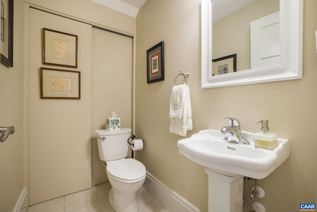 2055 Thomas Jefferson Pkwy, Charlottesville, VA 22902 - half bath with toilet, baseboards, and tile patterned floors
