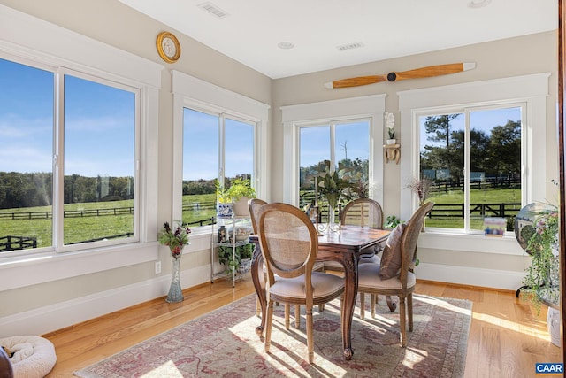 2055 Thomas Jefferson Pkwy, Charlottesville, VA 22902 - sunroom featuring a wealth of natural light, visible vents, and wood finished floors