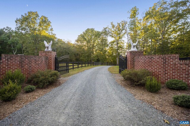 2055 Thomas Jefferson Pkwy, Charlottesville, VA 22902 - view of street featuring a gate and driveway